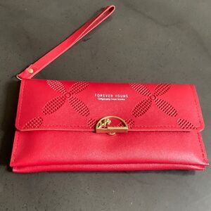 - NIP  bright red wristlet forever young originally from Korea